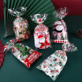50Pcs de Crăciun de Plastic Pungi de Bomboane Cookie-uri de Crăciun Cadou Pungi de Fulgi de zăpadă, Moș Crăciun Xmas Ambalaj Pungă de Anul Nou Favoruri